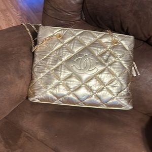 Gold Coco Chanel purse